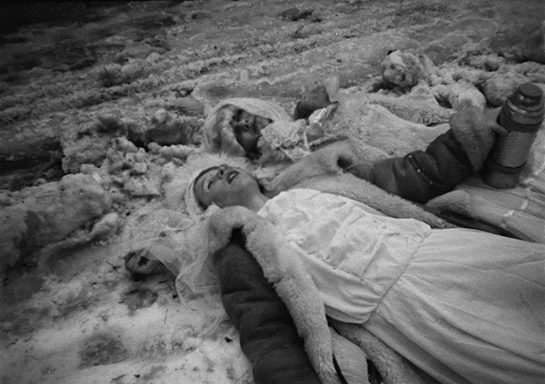 Still from Bread and Salt, 2009. Bread and salt are symbols of hospitality in Russian culture. Here, the bread is fed to the insatiable seagulls, and the salt is thrown into the low-salinity Baltic Sea