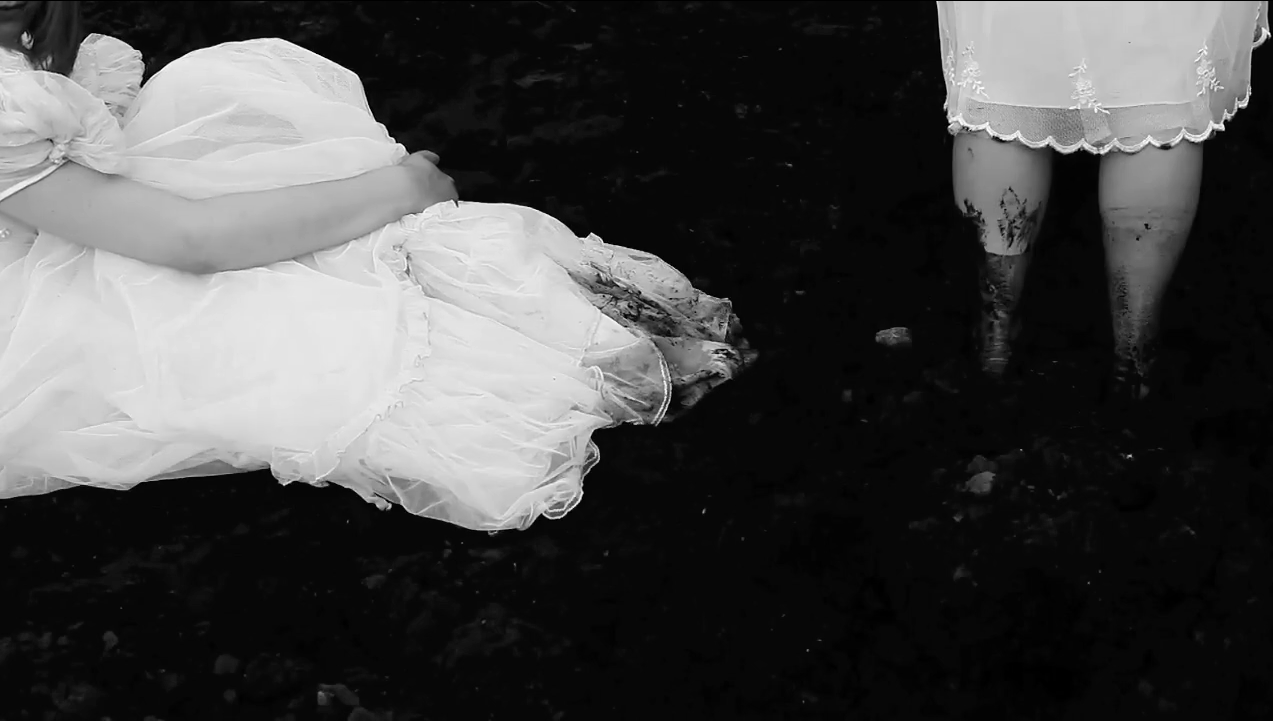 Dirt, 2010. Young women living on the Curonian Spit were considered the worst brides: the local soil of was infertile and they were almost dowerless. They usually went to the Lithuanian side of the bay to get married and rarely visited home afterwards