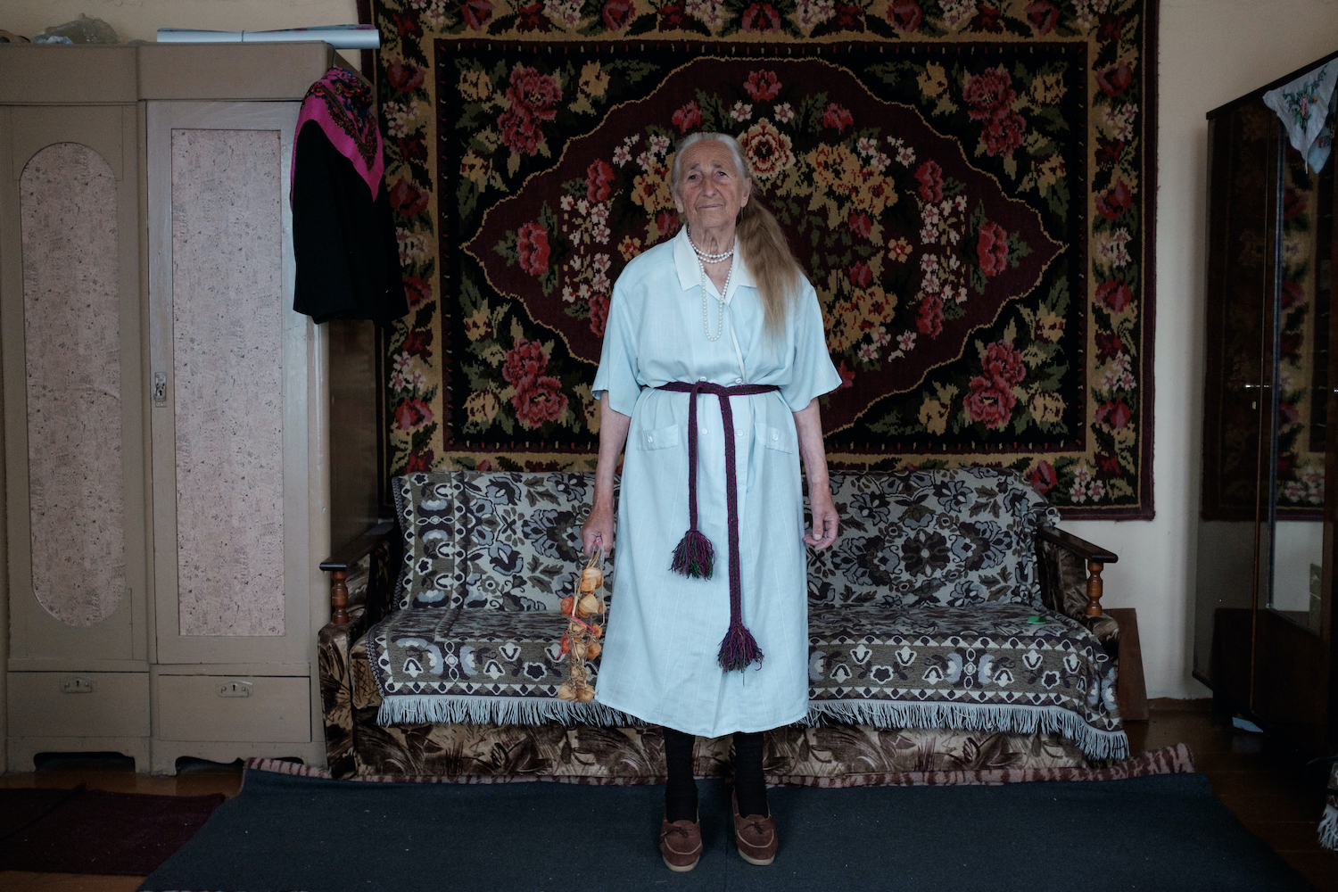 Vera’s Seasons, 2017. Born in 1926, Vera stayed in the Polish, then Soviet, and finally Belarusian town of Volozhin all her life. Here, she is wearing a dress with a belt, which she inherited from her father
