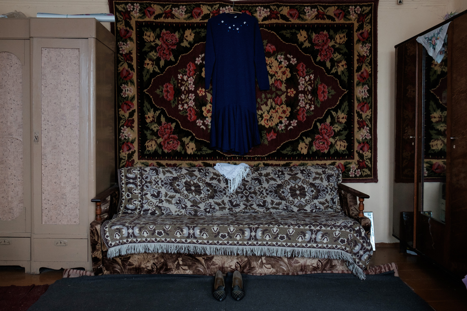 Vera’s Seasons, 2017. The blue dress, white scarf, and sensible shoes that Vera has set aside for her own funeral, “so that in the next world she would be comfortable and look beautiful”