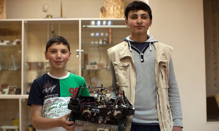 Rafael and Sahak Sahakyan with their firefighter robot. (Image: Suren Stepanyan)