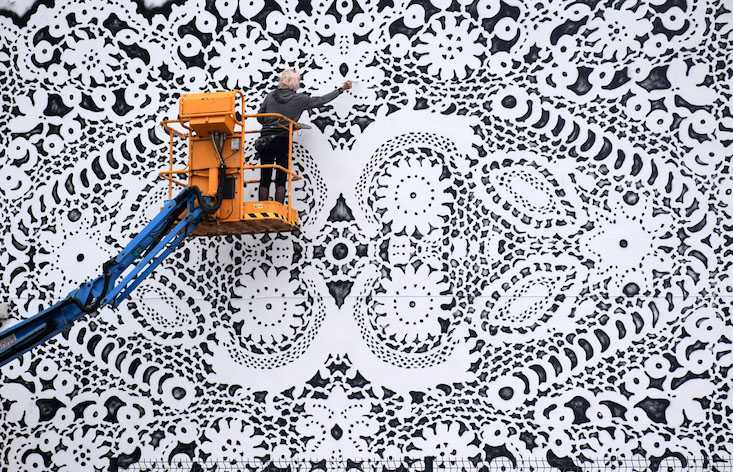 Meet the Polish painter mixing lace doilies and kick-ass street art