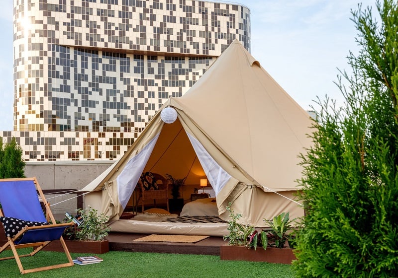 This translucent tent transforms into a cinema underneath the stars