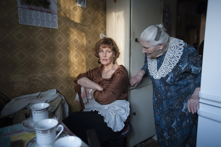 Olga is tired after preparing food for her birthday. Nadezhda comforts her (Image: Ageing, Natalya Reznik, 2011 — present)