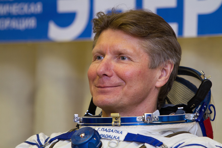 Record-breaking cosmonaut returns to Earth