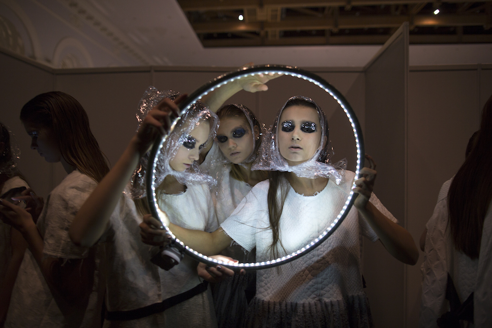 Fashion week moments: models sport cling film-inspired scarves at IVKA