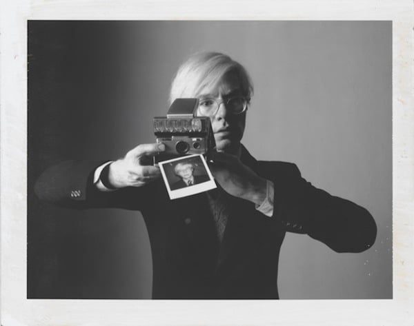 Andy Warhol with camera © Oliviero Toscani (1974)