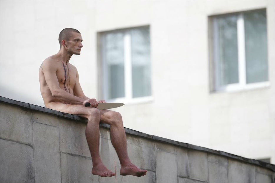 Performance artist Pyotr Pavlensky cuts off earlobe in latest act of protest