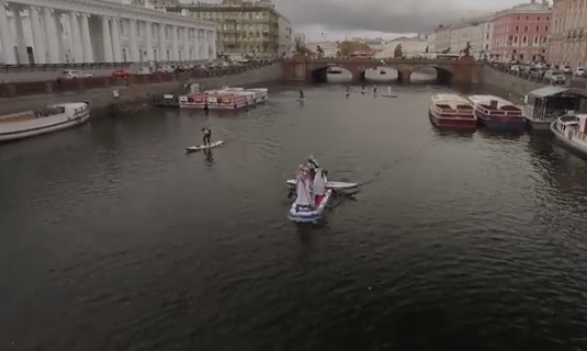 Go paddle boarding on a St Petersburg canal