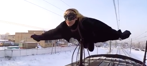 Meet Kobzarro, the Russian Batgirl who surfs on trains