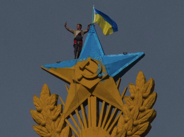 Activists paint Moscow's 'Stalin Tower' with Ukraine colours