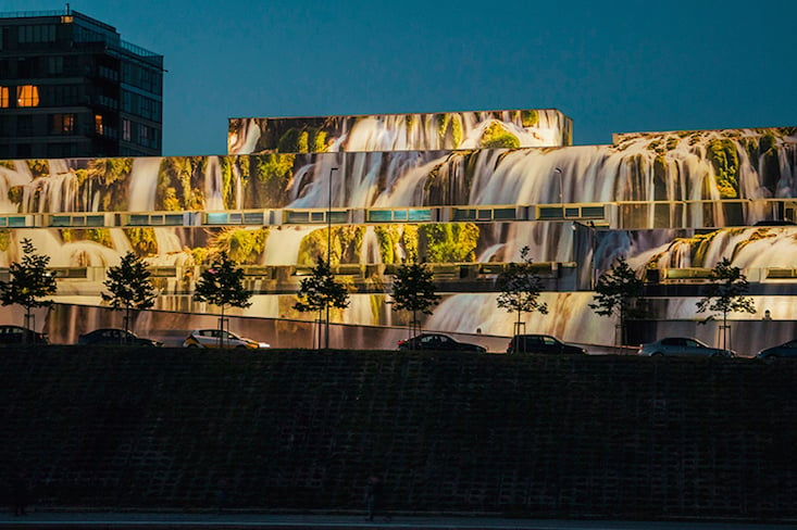 Former Soviet garage becomes a huge waterfall in Vilnius