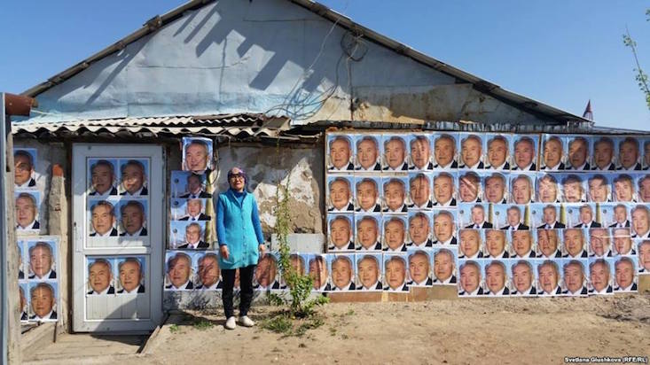 Meet the Kazakh woman using presidential portraits to avoid eviction